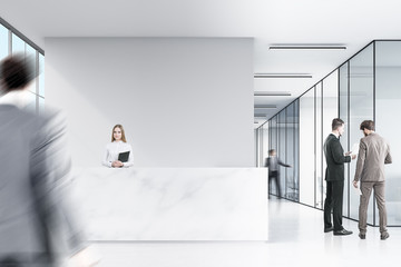 Fototapeta premium Two men in suits are talking in a corner of an office hall. There is a marble reception desk and a corridor in the background. 3d rendering. Mock up.