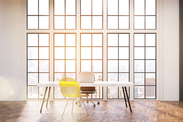 Workplace with white desk, an office chair and a transparent yellow visitor chair. Large windows are in the background. 3d rendering. Toned image