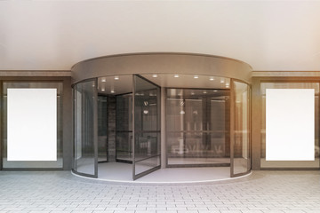 Glass doors of corporate building, posters, toned