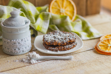 Cookies on the plate with sugar powder