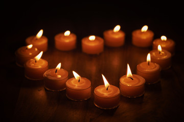 tealight candles in a shape of a heart, shallow focus photo