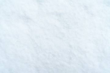 Fototapeta na wymiar fresh snow background texture, shot directly above