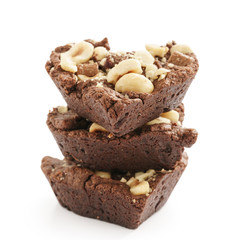 homemade heart shaped chocolate cookies with hazelnuts and chocolate pieces isolated on white background