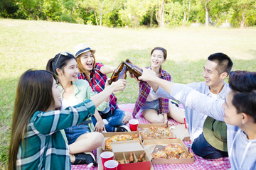 young Friends having fun together  and drinking  beer