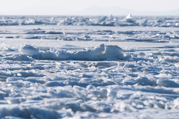 Fototapeta premium Frozen sea view on sunny day.