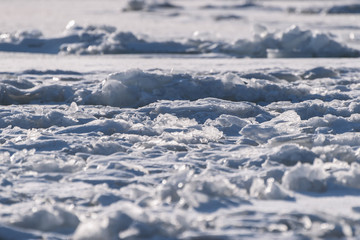 Frozen sea view on sunny day.