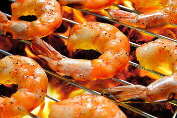 Grilled shrimps,prawns on the flaming grill