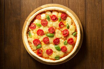 pizza at wooden table
