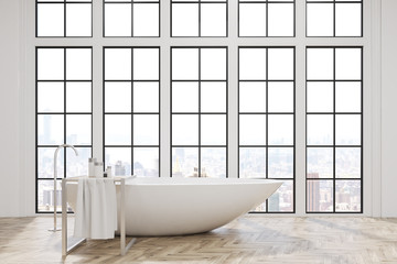 Naklejka na ściany i meble Bathroom with white tub and big windows