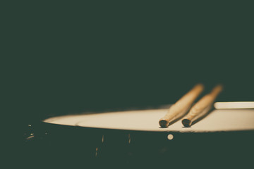Snare drum and a pair of drum sticks
