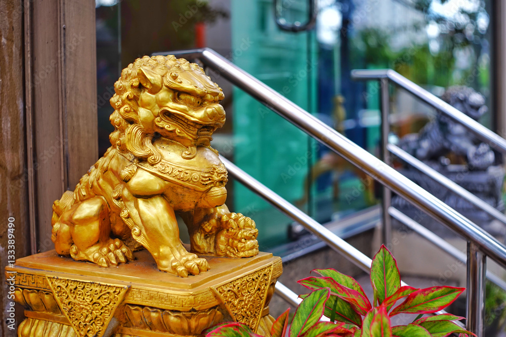 Wall mural chinese lion sculpture belief.