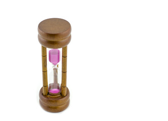 wooden frame and purple sand hourglass isolated on white background