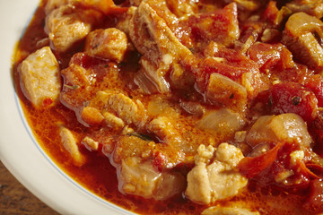 a bowl of chili made with chicken, often called 