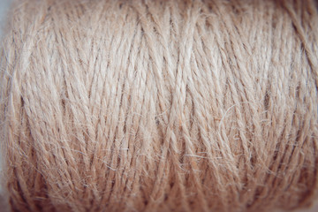 background from a hank of cord, string beige color