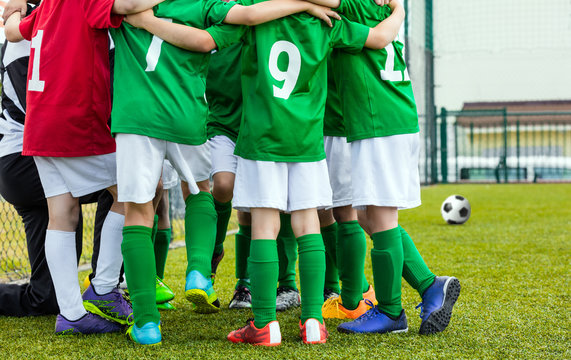 Kids Soccer Team with Coach. Youth Soccer Club. Boys Standing Together and Motivating Each Other Before the Final Tournament Game. Football Coach Motivational Speech for Kids