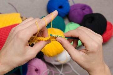 Close-up of hands knitting