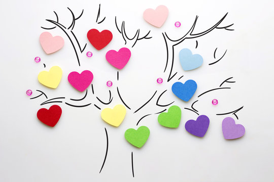 Love tree / Creative valentines concept photo of hearts on the tree on white background.