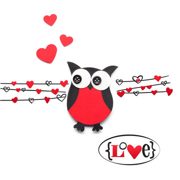 On the wire / Creative valentines concept photo of paper owl with hearts on white background.