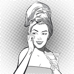 Beautiful young woman with towel on her head.