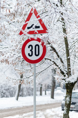 Speed limit sign with winter background