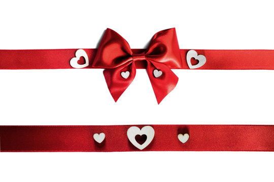 Red gift bow and hearts