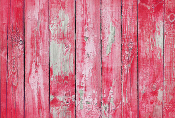 red old wooden fence. wood palisade background. planks texture