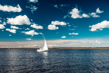 white sail white clouds