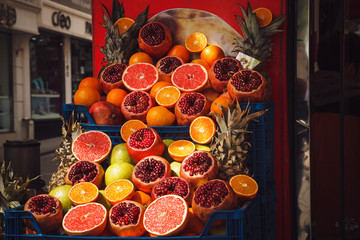 Cut pomegranates and grapefruits on a Turkish market