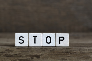 Stop, written in cubes