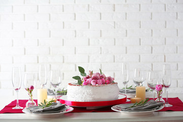 Delicious wedding cake on beautifully served table