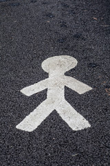 Sybol of a man on the tarmac