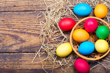 Colorful Easter eggs in a basket