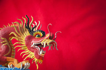 celebrate Chinese New Year background with dragon statue.