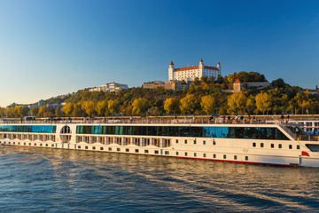 View on Bratislava castle and the boat on the Danube river
