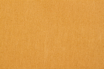 Abstract yellow Fabric texture, close-up with copy space for text or image.