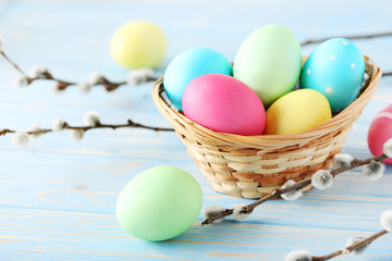 Easter eggs on a blue wooden table