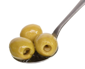 Olives in a spoon closeup