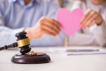 Judge gavel deciding on marriage divorce