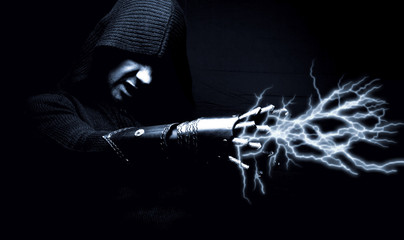 Emotional, young and attractive assassin in gloves with some mag