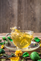 Green tea in cup of glass