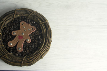 hanging bear love with coffee beans and vine