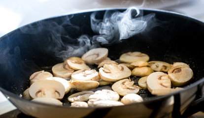 Roasting champignon mushrooms