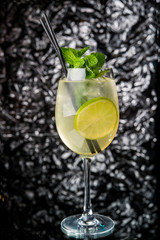 Alcoholic cocktail on the bar, close-up in glass