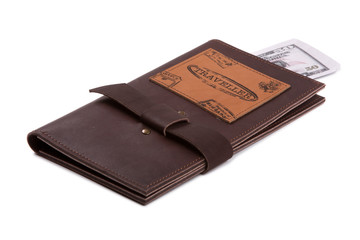 Traveler wallet with money on white background