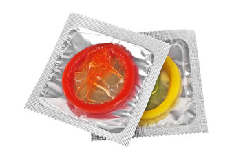 Close up of a colored condoms on white background