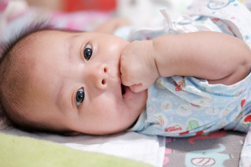 Cute baby 3 months, close-up portrait