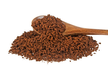 Instant coffee grains in wooden spoon on a white background
