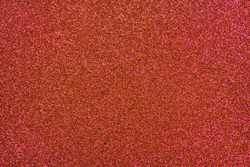 Fototapeta premium Glittery texture. Shining background. Red glitter