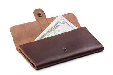 Brown purse with money on white background
