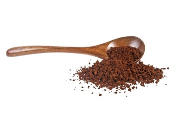 Instant coffee grains in wooden spoon on a white background